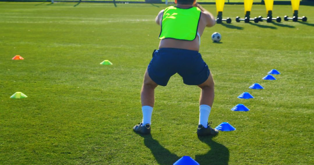 Soccer Player Training with Cones on Field - Free Images, Stock Photos and Pictures on Pikwizard.com