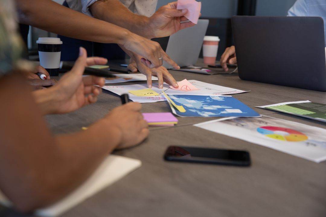 Team Collaborating on Project at Creative Office Meeting