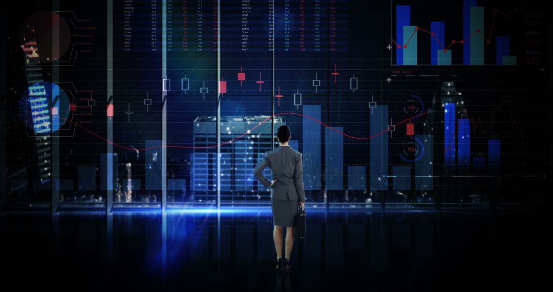 Businesswoman Analyzing Financial Data with Interactive Digital Interface