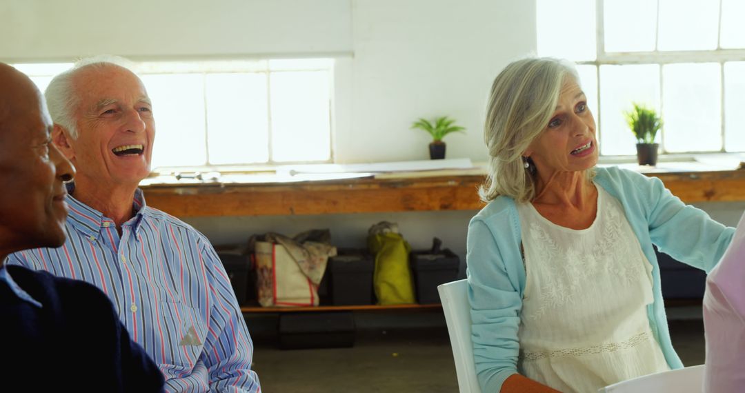 Seniors Engaged in Cheerful Group Discussion