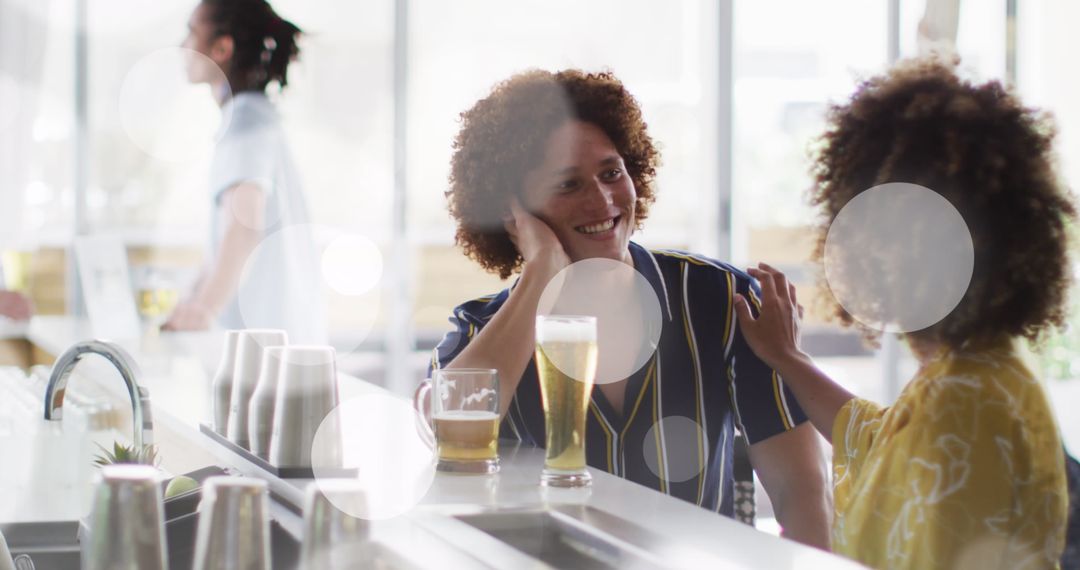Friends Enjoying Drinks in Modern Bar Environment