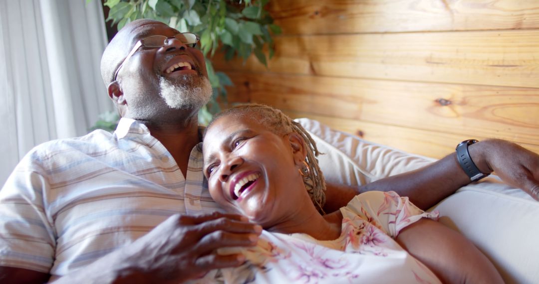Senior African American Couple Relaxing on Couch