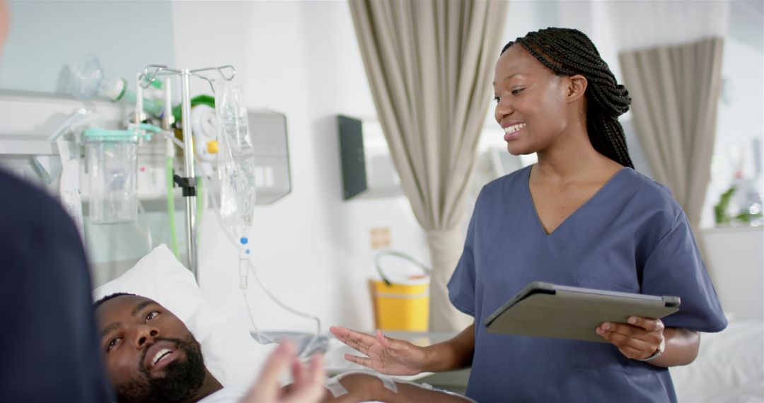 Nurse Assisting Patient in Hospital Bed with Tablet - Free Images, Stock Photos and Pictures on Pikwizard.com