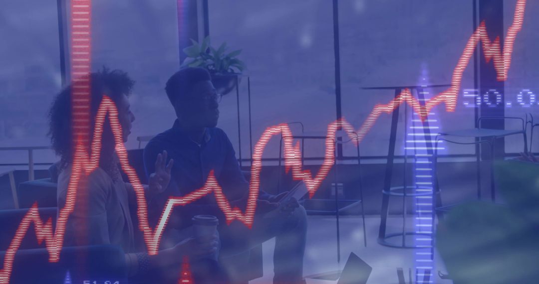 Analyzing financial data with tablet and analytics overlay in modern office lounge