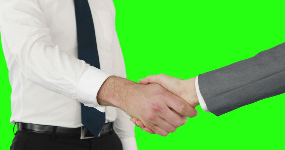 Businessmen Shaking Hands on Green Screen, Indicating Partnership - Free Images, Stock Photos and Pictures on Pikwizard.com