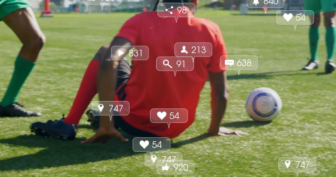 Soccer Player Engaging Fans Digitally on Turf Field