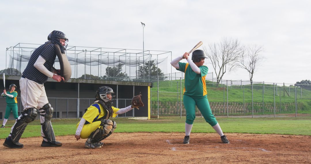 Competitive Young Softball Team in Action at the Field