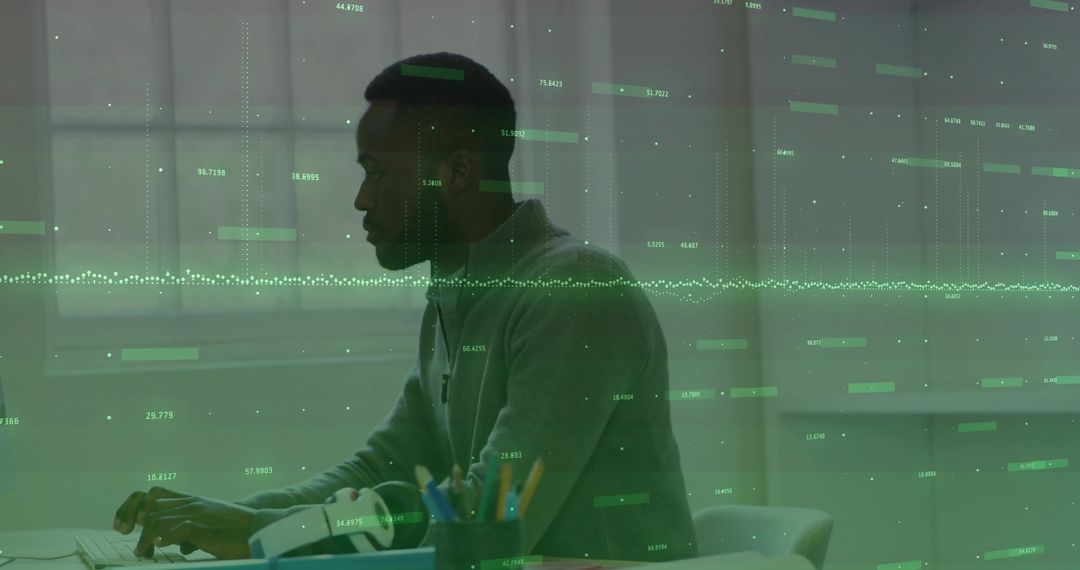 Focused Man Analyzing Data in Virtual Reality Workspace