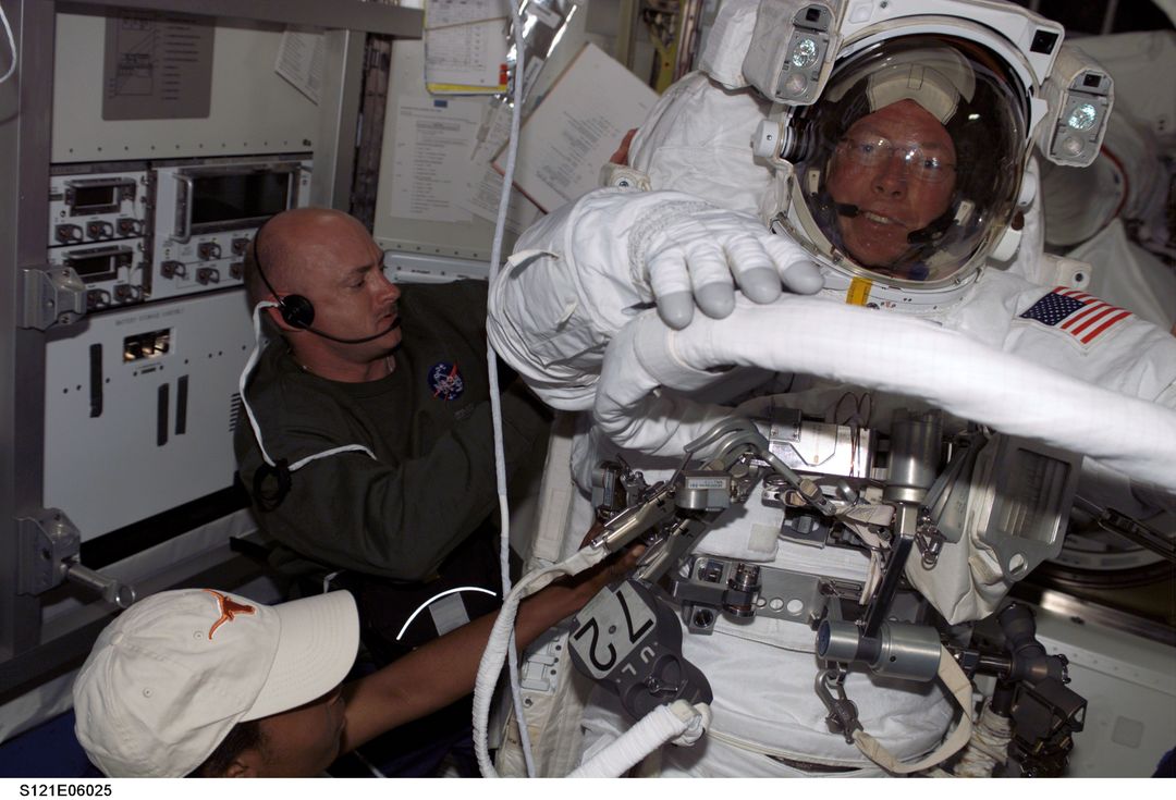 Astronauts Preparing for Spacewalk Inside International Space Station - Free Images, Stock Photos and Pictures on Pikwizard.com