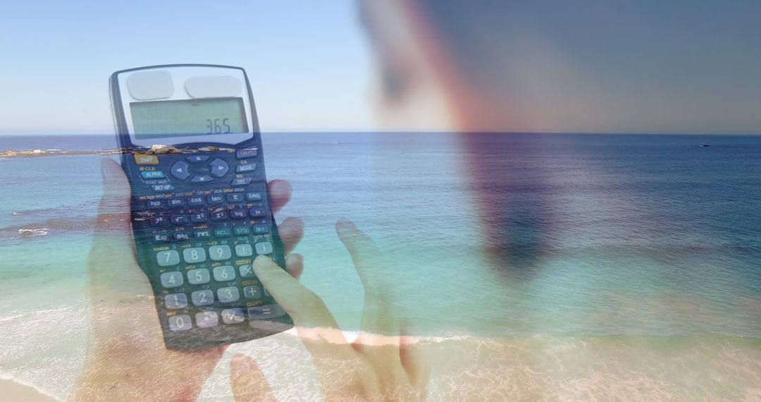 Using Calculator on Beach for Relaxing Financial Planning