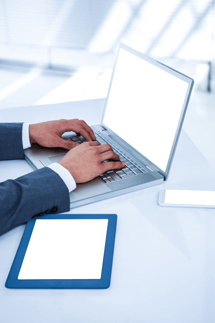 Transparent Devices and Businessman Using Laptop