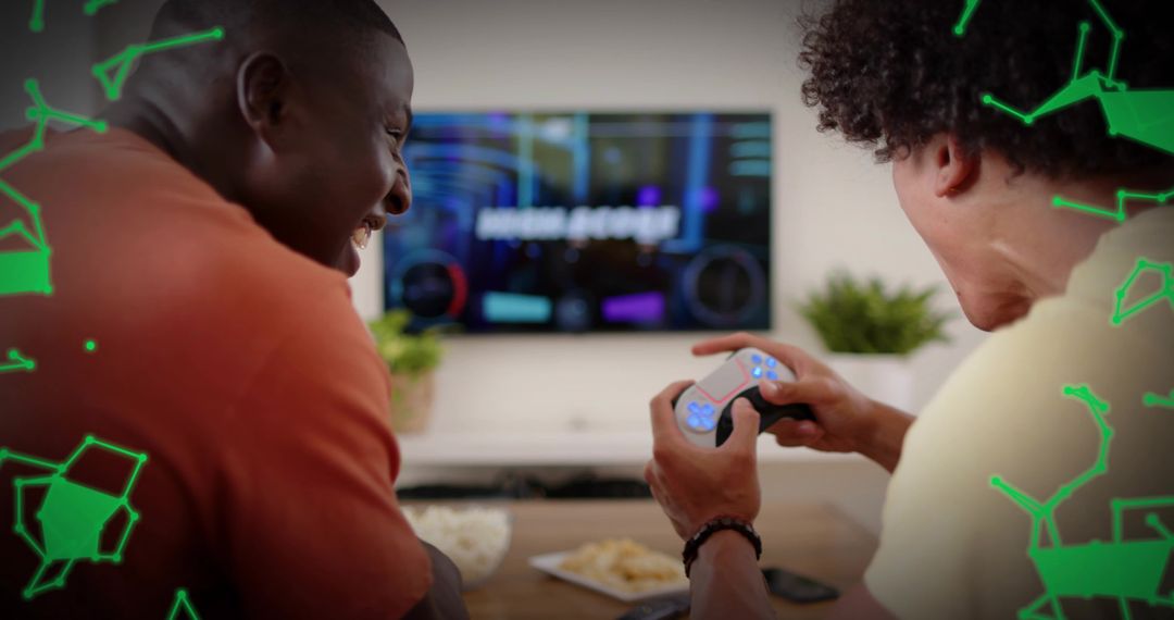 Friends playing console game on couch laughing and competing with wireless controller