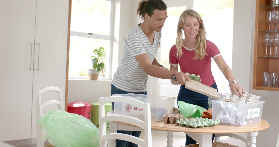 Diverse Couple Collaborating on Home Waste Segregation