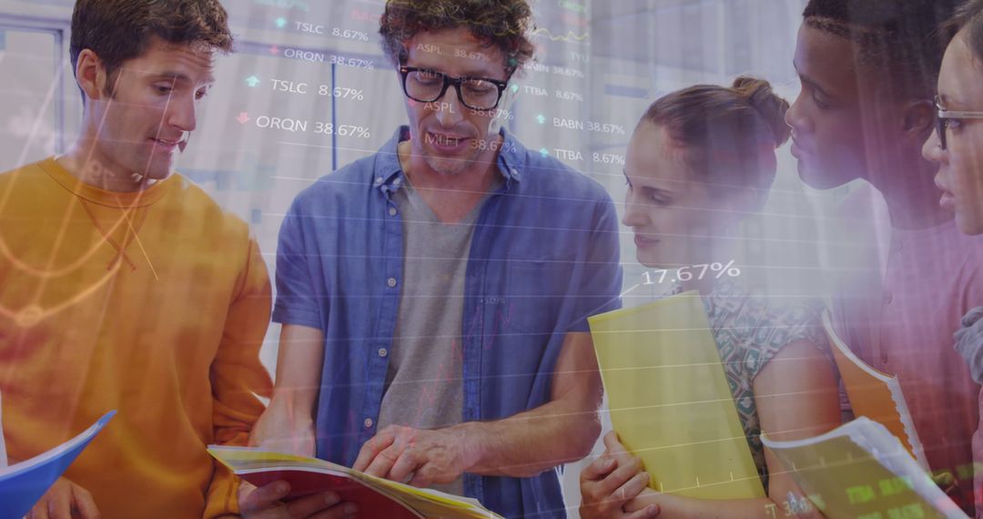 Diverse Team Analyzing Data Trends and Business Strategies