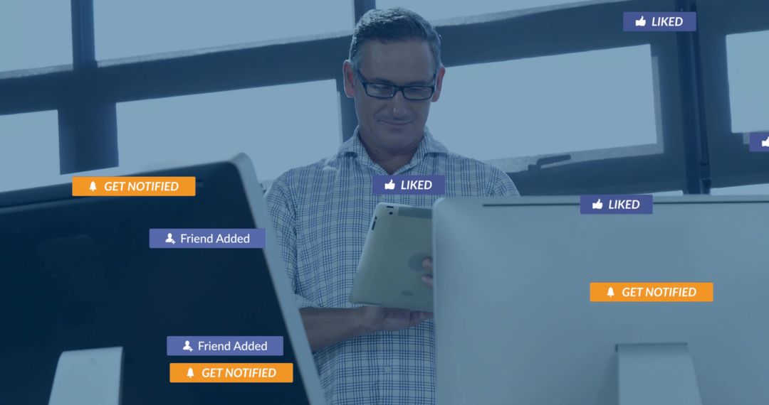 Businessman Checking Tablet for Social Media Notifications in Modern Office