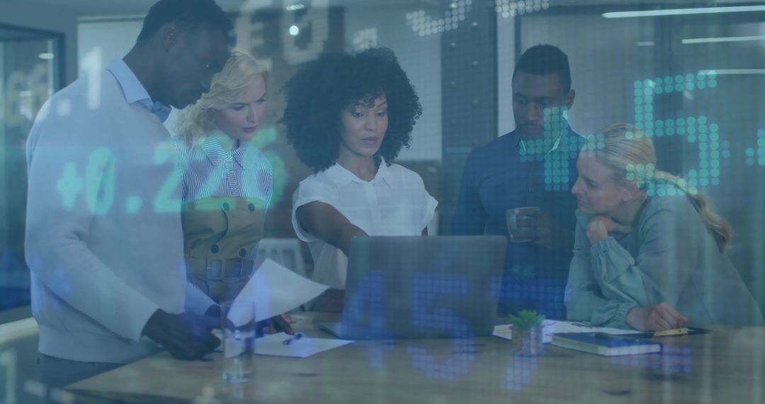 Diverse Team Analyzing Financial Data on Screen