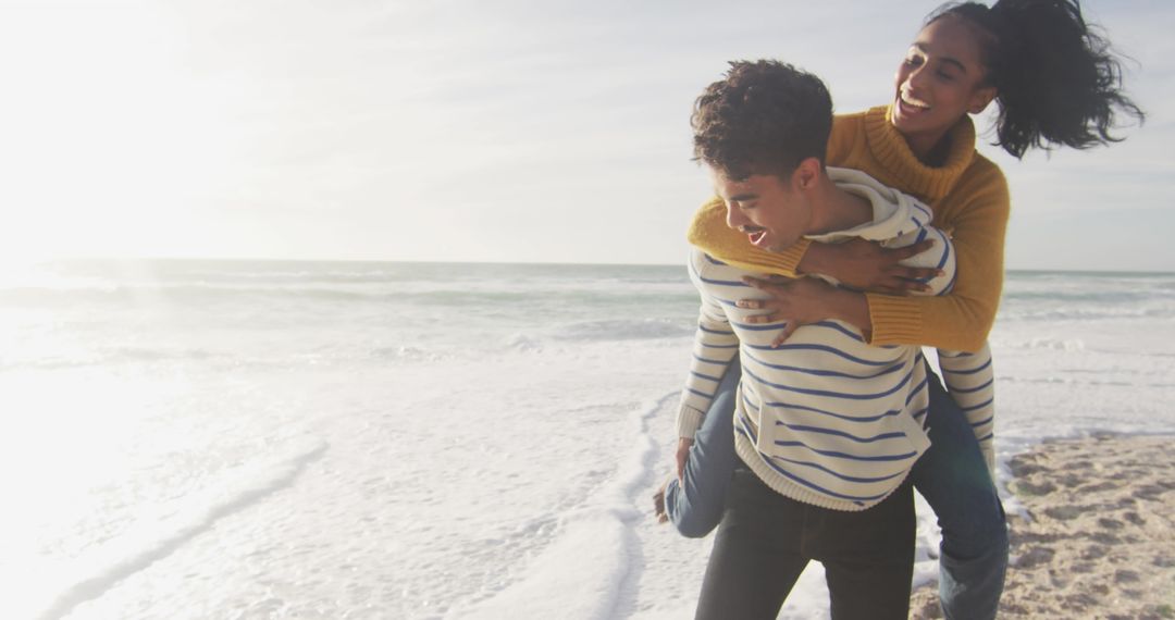 Joyful Piggyback Ride on Sunny Beach