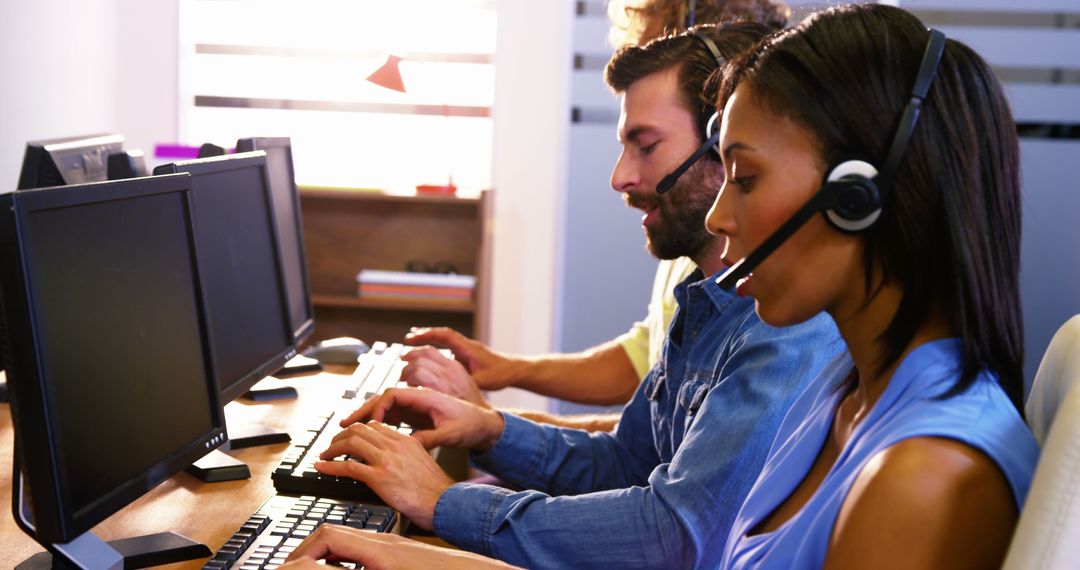 Customer Service Representatives Using Headsets at Modern Office - Free Images, Stock Photos and Pictures on Pikwizard.com