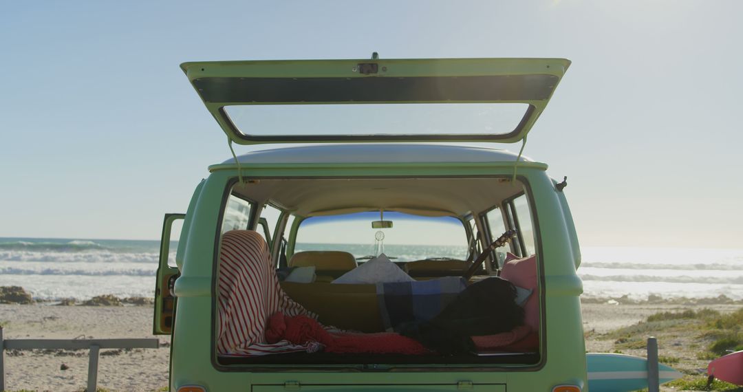 Van Parked at Beach with Open Doors Facing Sea