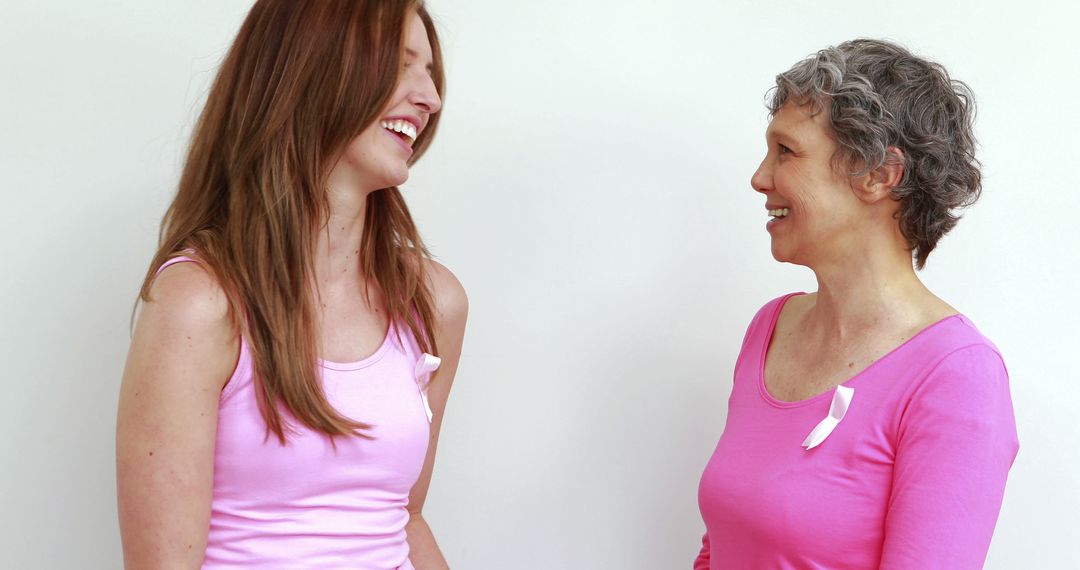 Two Women Advocating Breast Cancer Awareness, Wearing Pink - Free Images, Stock Photos and Pictures on Pikwizard.com