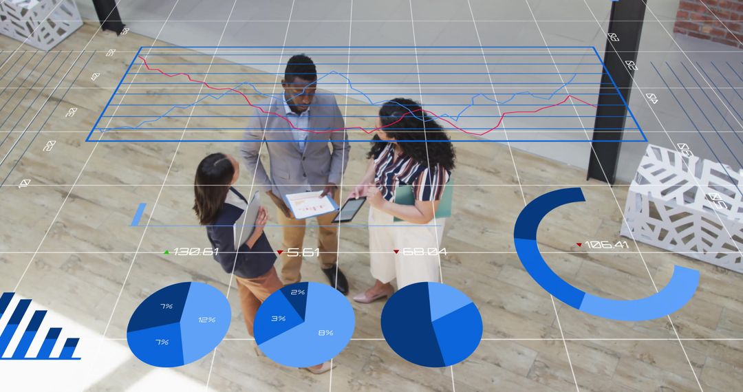 Business Team Analyzing Financial Graphs and Statistics in Modern Office