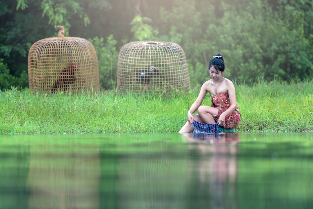 Full Length of Boy Sitting on Grass - Free Images, Stock Photos and Pictures on Pikwizard.com