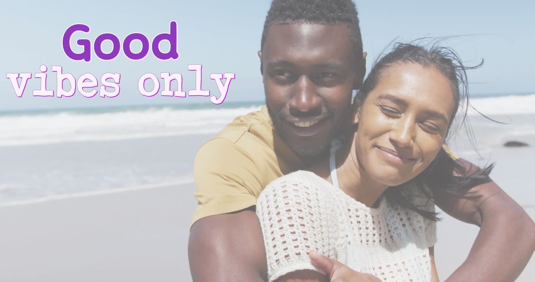 Happy Couple Embracing on Sunny Beach with Good Vibes Only