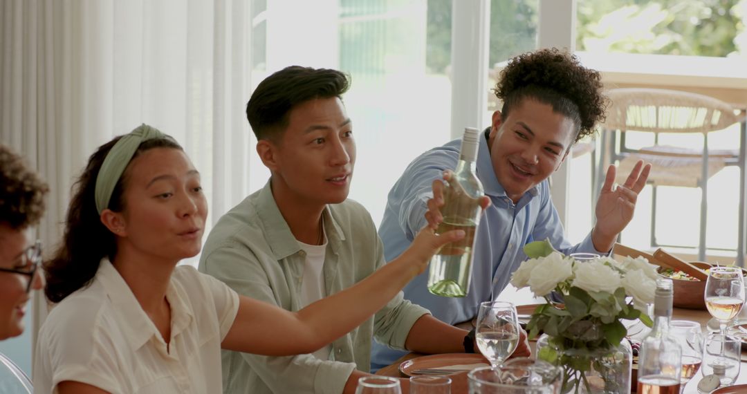 Friends Celebrating Together with Toast at Wedding Reception