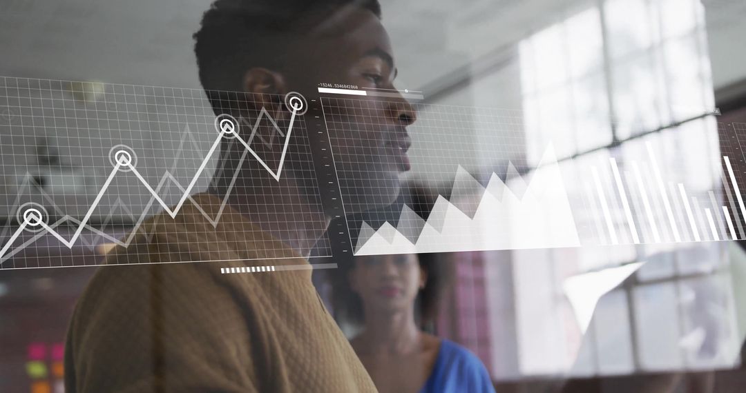 Business Professionals Analyzing Financial Graph in Office Setting