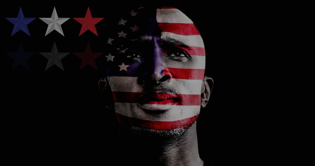Man with American Flag Paint on Black Background for Patriotic Themes