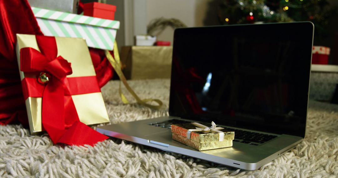 Laptop with Christmas Gifts and Decorations - Free Images, Stock Photos and Pictures on Pikwizard.com