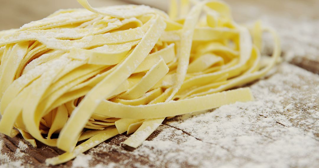 Close-Up of Fresh Homemade Pasta on Wooden Surface - Free Images, Stock Photos and Pictures on Pikwizard.com