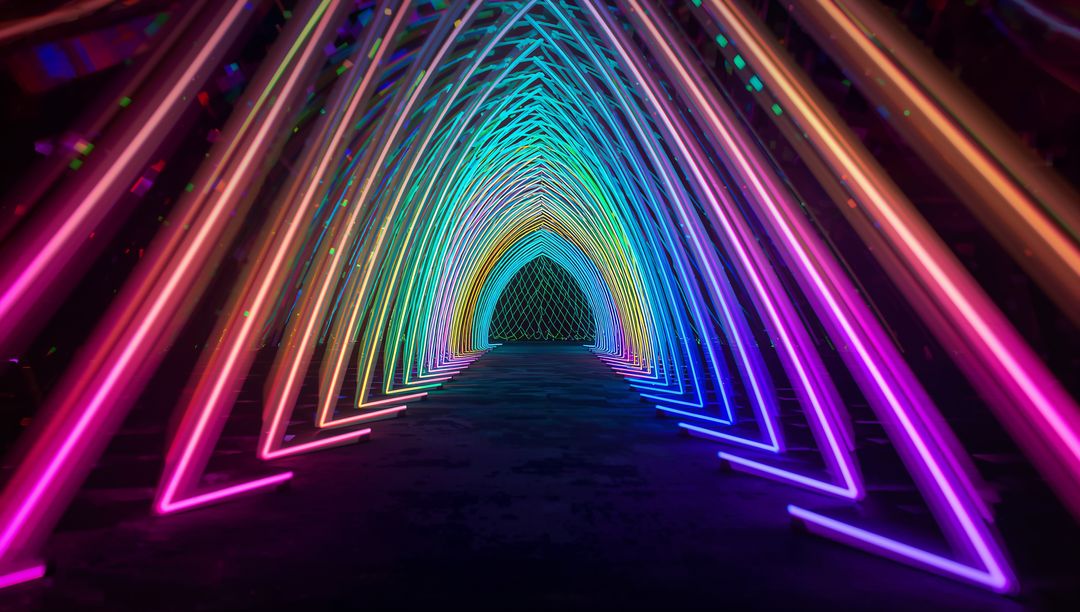 Vibrant Neon Light Tunnel with Triangular Arches