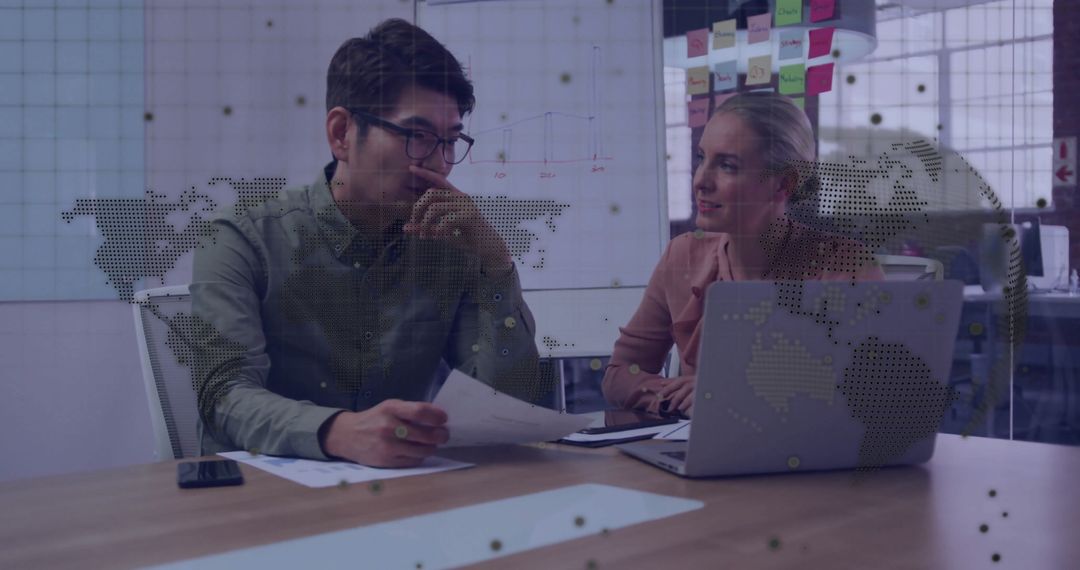 Collaborative Business Strategy Meeting with Digital Interface