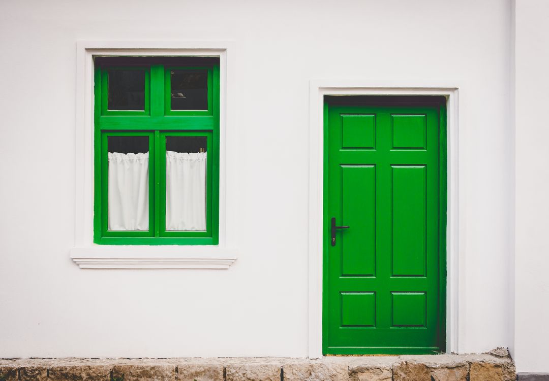 Bright Green Door and Window on Minimalist White Wall - Free Images, Stock Photos and Pictures on Pikwizard.com