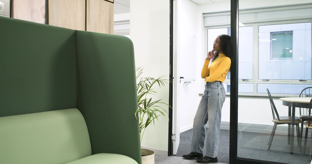 Professional Man in Office Corridor Talking on Smartphone