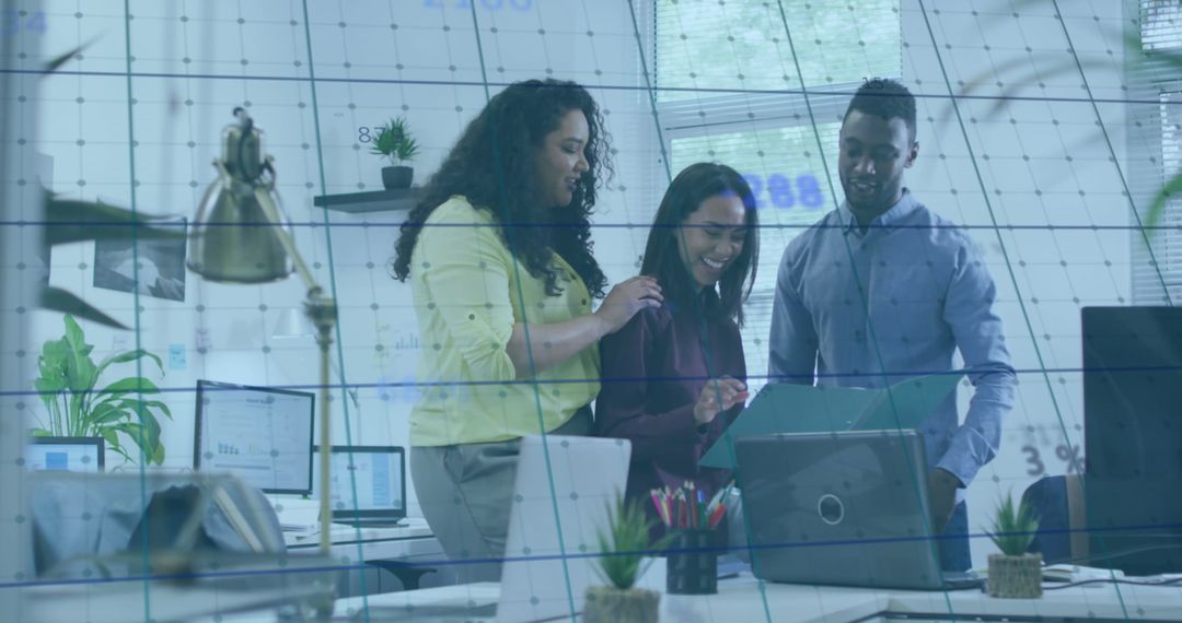 Team Analyzing Data with Digital Overlay in Office