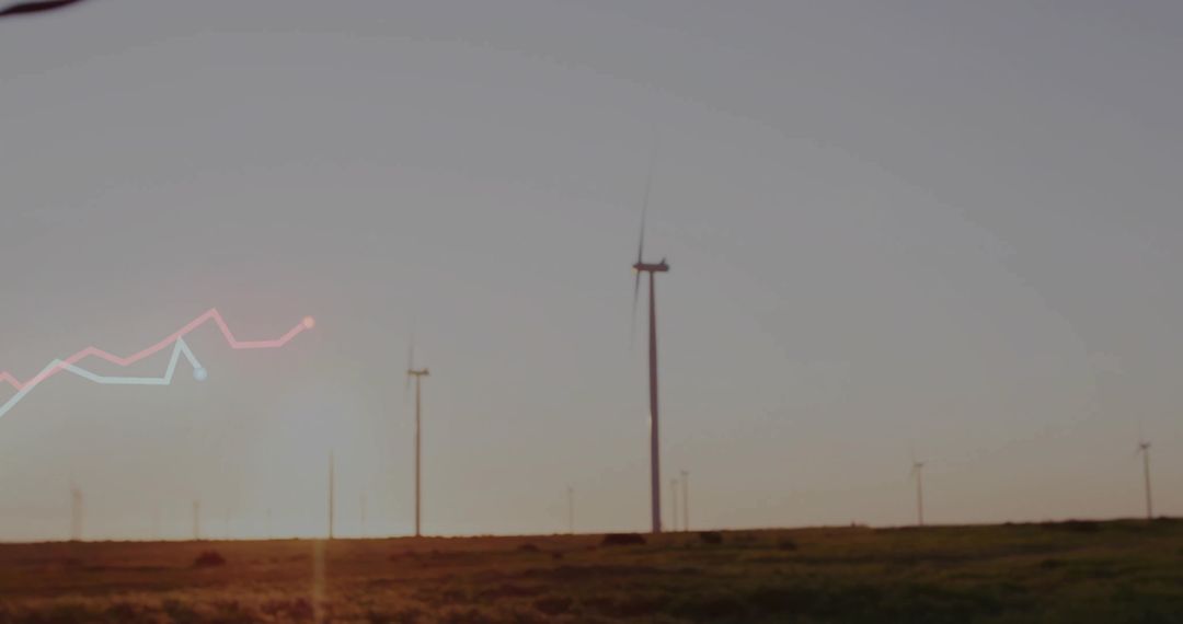 Wind Turbines with Graphical Overlay During Sunset