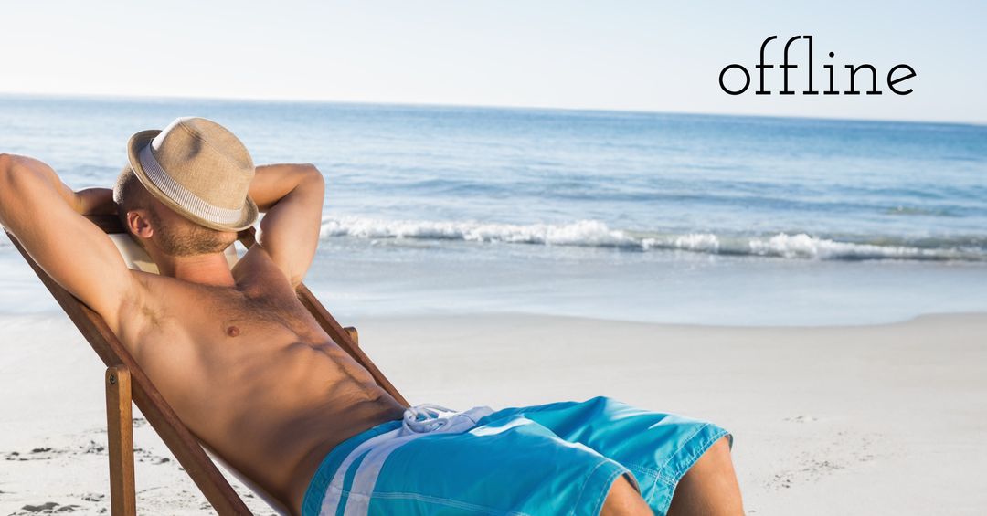 Relaxed Man Enjoying Beach while Offline Sign Stresses Detachment