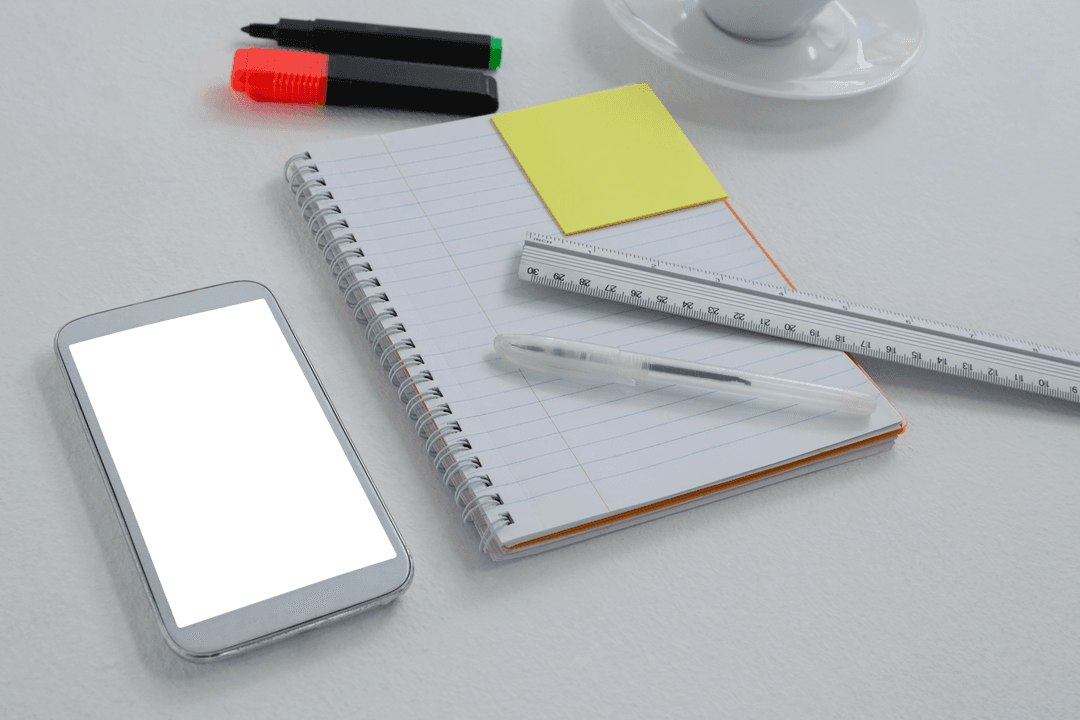 Transparent Mobile Phone with Stationery on Desk Scene