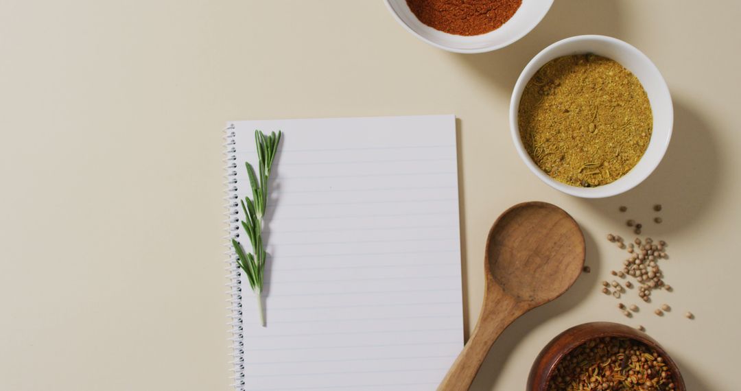 Notepad and Bowls of Spices on Beige Surface for Recipe Ideas - Free Images, Stock Photos and Pictures on Pikwizard.com