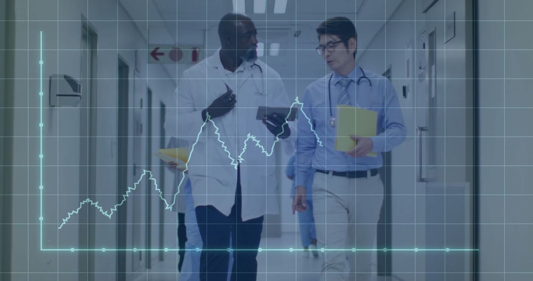 Doctors Analyzing ECG Graph in Hospital Corridor