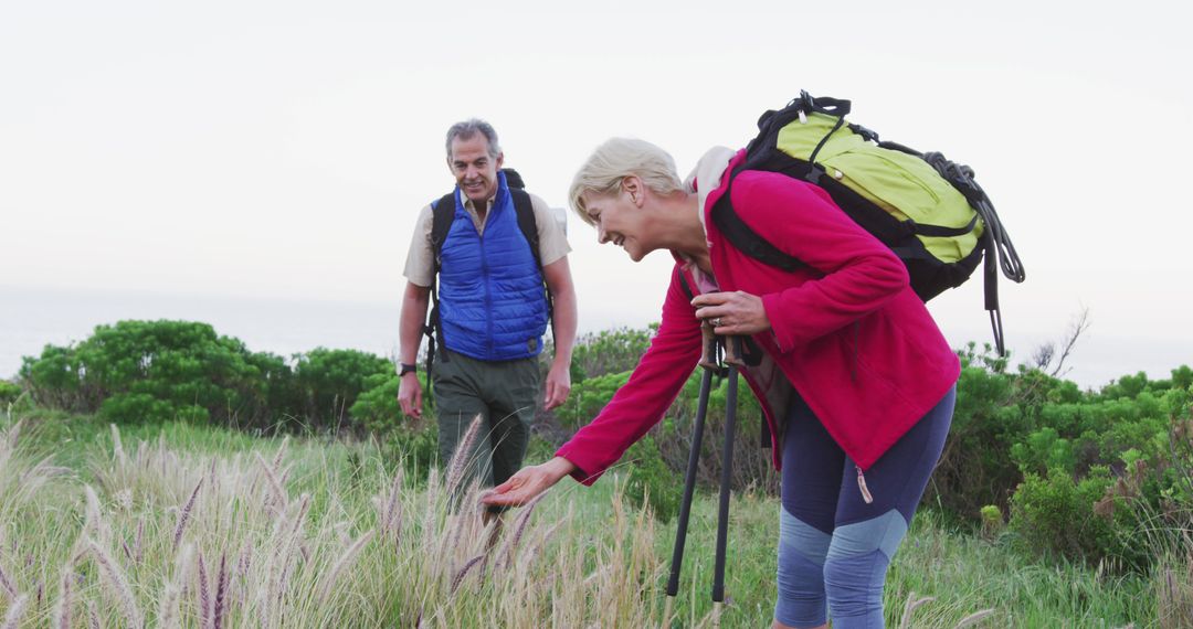 Senior Hikers Exploring Nature Together on Trekking Adventure
