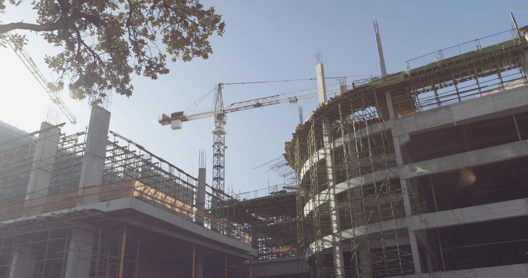 Transparent Urban Skyline with Tower Cranes at Construction Site