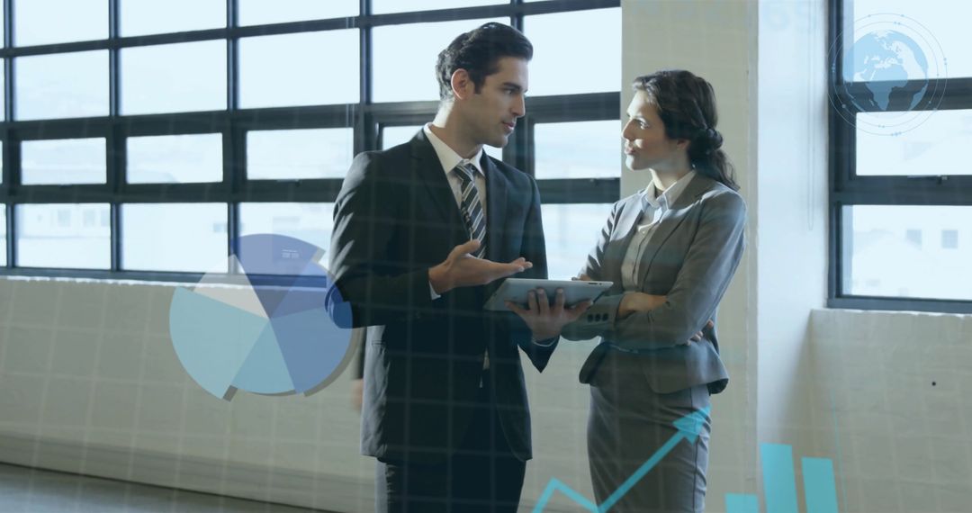 Business Professionals Analyzing Data with Digital Interface in Modern Office