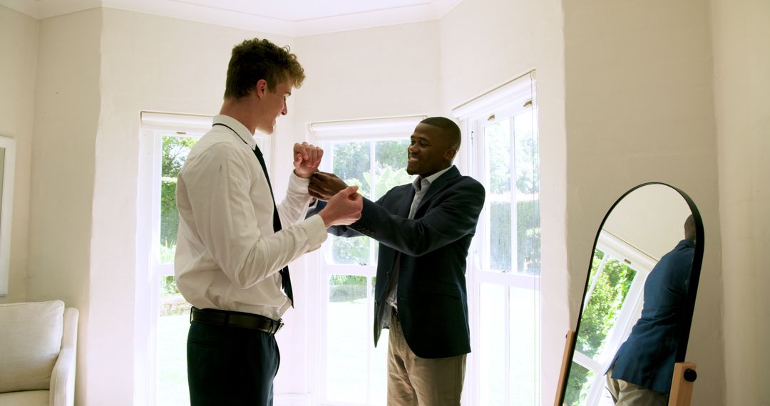 Groom Preparing for Wedding with Best Man at Home