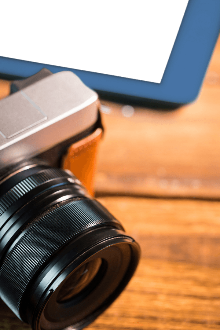 Transparent Camera and Tablet Closeup on Wooden Floor
