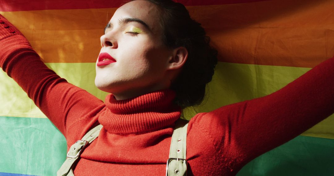 Caucasian non-binary transgender woman holding lgbt flag - Free Images, Stock Photos and Pictures on Pikwizard.com