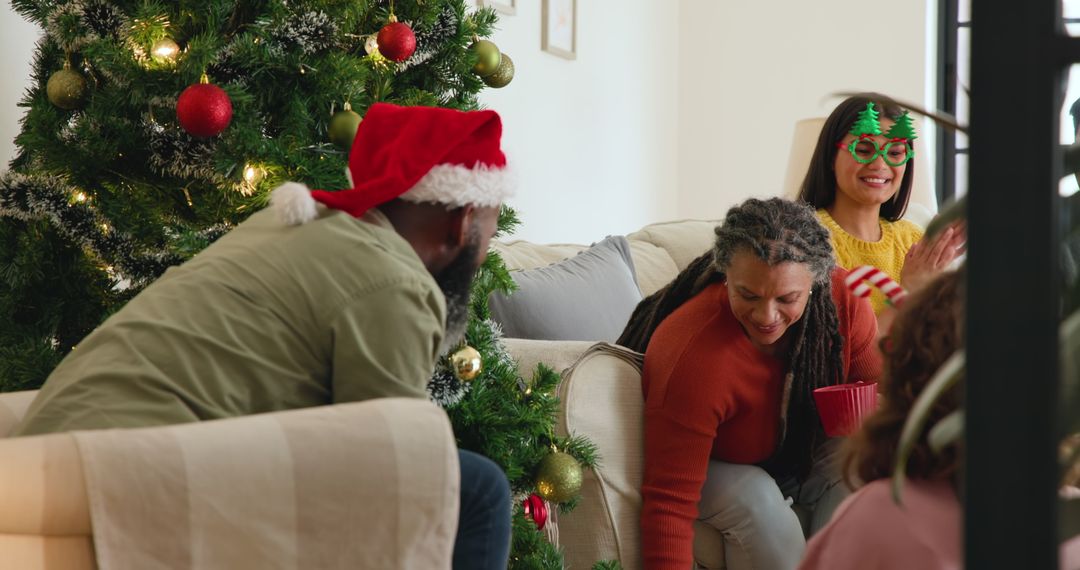 Joyous Diverse Family Celebrating Christmas Around Tree
