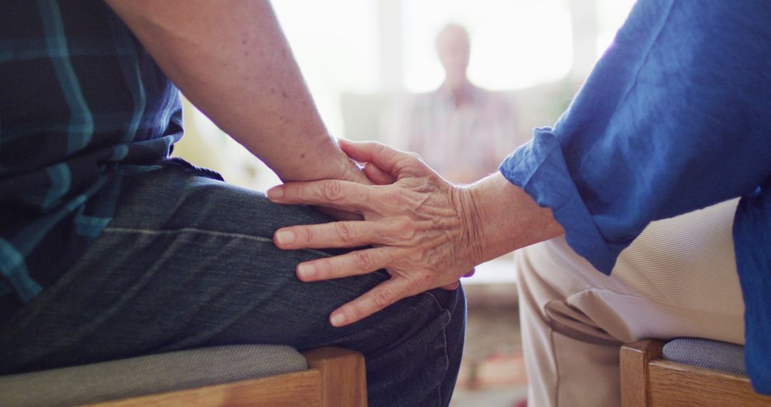 Comforting Hands, Elderly Friends Supporting Each Other in Group Setting - Free Images, Stock Photos and Pictures on Pikwizard.com